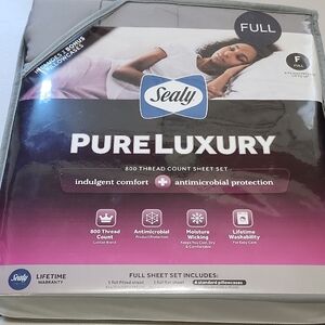 NEW Full Size Sealy PureLuxury Sheets with 4 pillowcases.